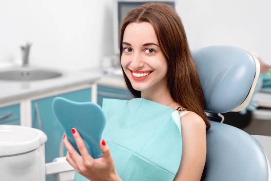 Отбеливание зубов в стоматологическом кресле